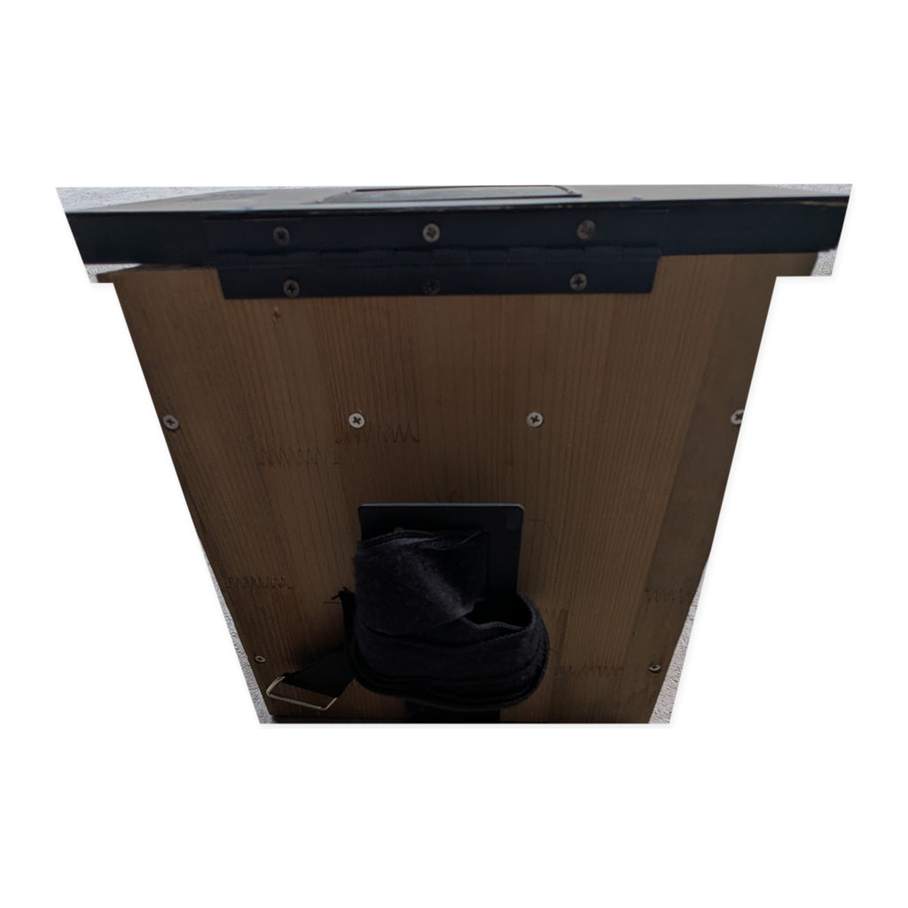 Rear view of the actual Evergreen smart bird feeder and mounting area on studio white
