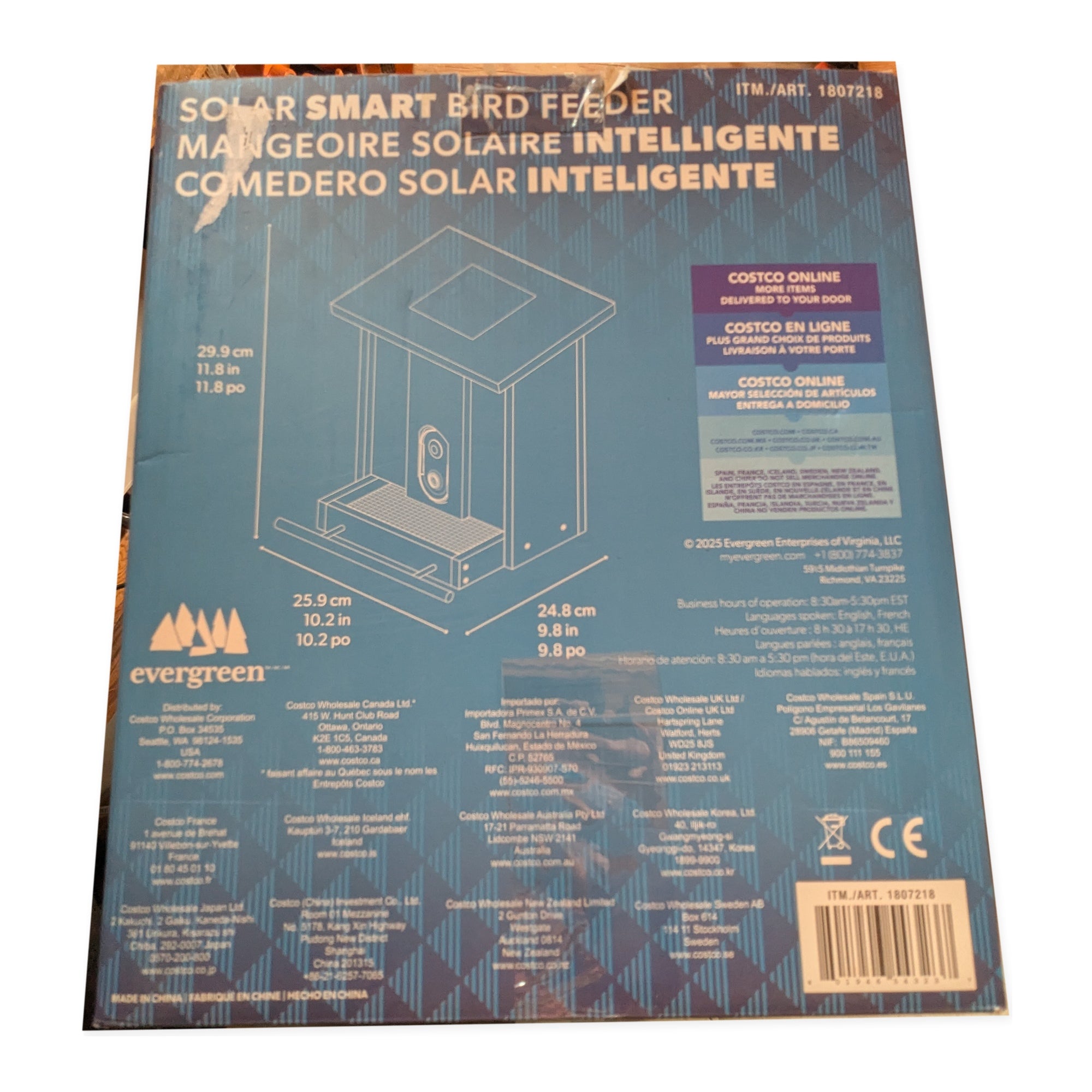 Retail package dimensions and specifications panel for the Evergreen smart bird feeder on studio white