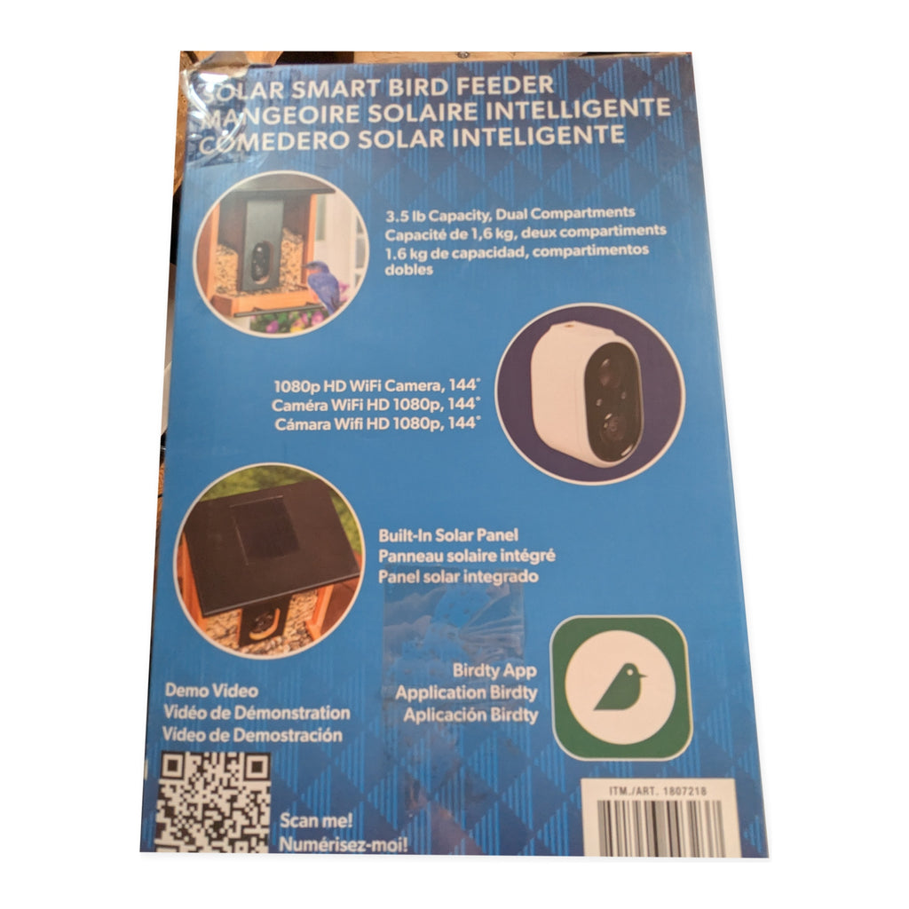 Retail package camera, app, and feeder feature panel for the Evergreen smart bird feeder on studio white