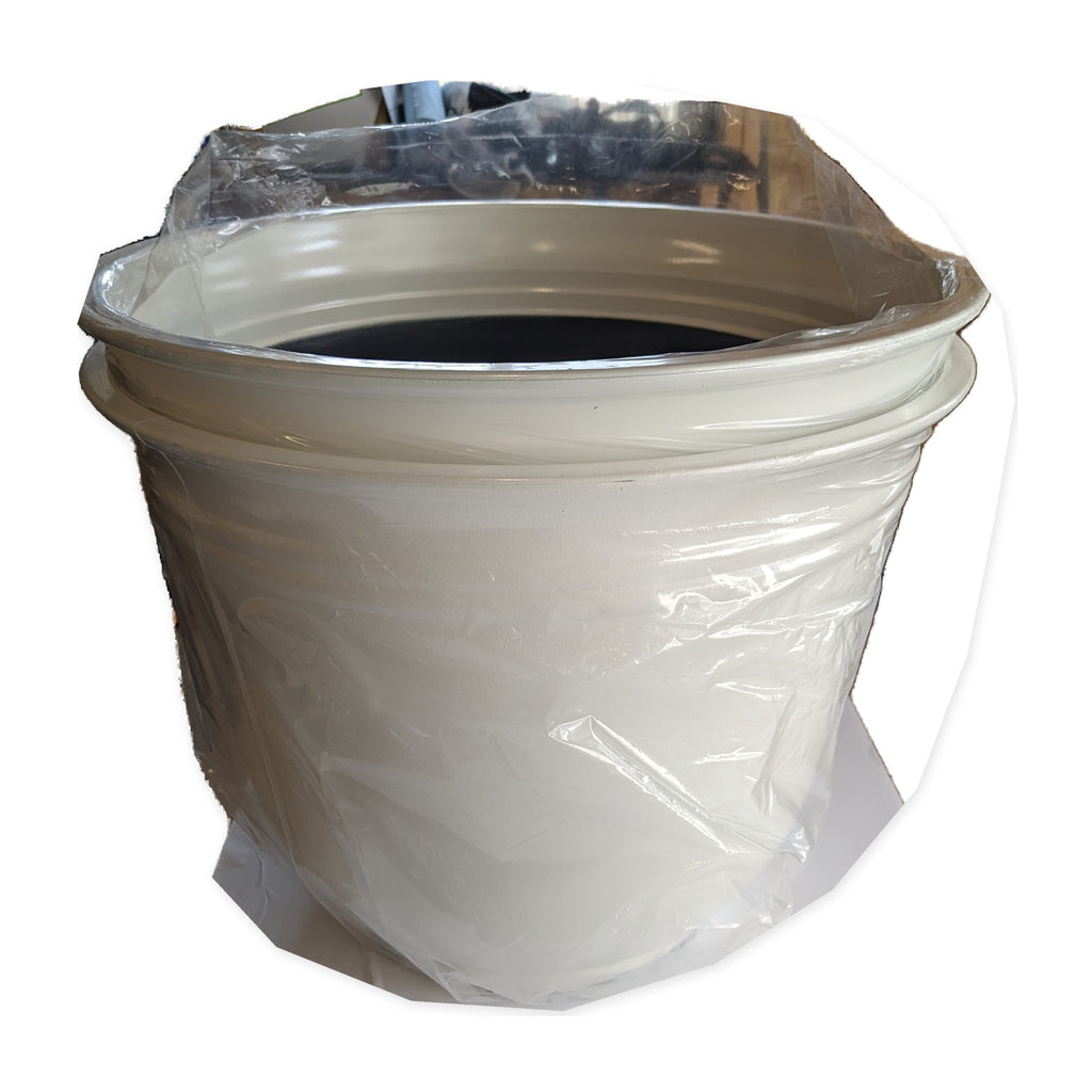 Single actual Trendspot Theo 18-inch white resin planter on studio white