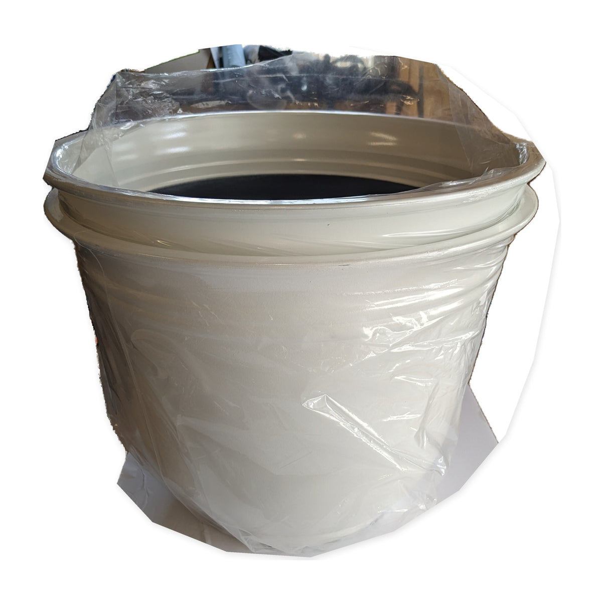 Single actual Trendspot Theo 18-inch white resin planter on studio white
